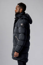 Load image into Gallery viewer, Woodpecker Men&#39;s Penguin Long Winter coat. High-end Canadian designer winter coat for men in &quot;Black Diamond&quot; colour. Woodpecker cruelty-free winter coat designed in Canada. Men&#39;s heavy weight long length premium designer jacket for winter. Superior quality warm winter coat for men. Moose Knuckles, Canada Goose, Mackage, Montcler, Will Poho, Willbird, Nic Bayley. Extra warm. Shiny parka. Stylish winter jacket. Designer winter coat.
