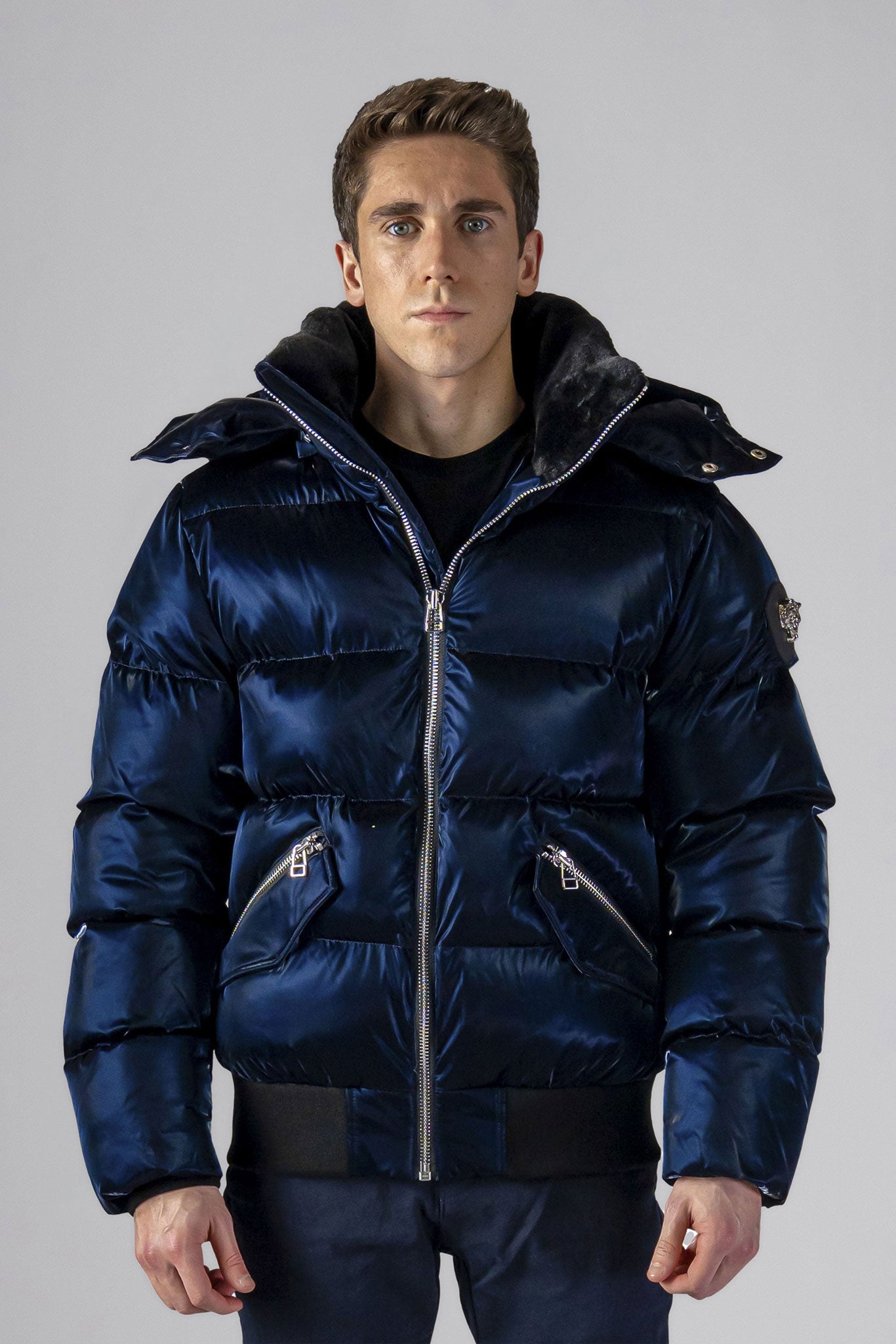 Woodpecker Men's Woody Bomber Winter coat. High-end Canadian designer winter coat for men in shiny “All Wet Navy