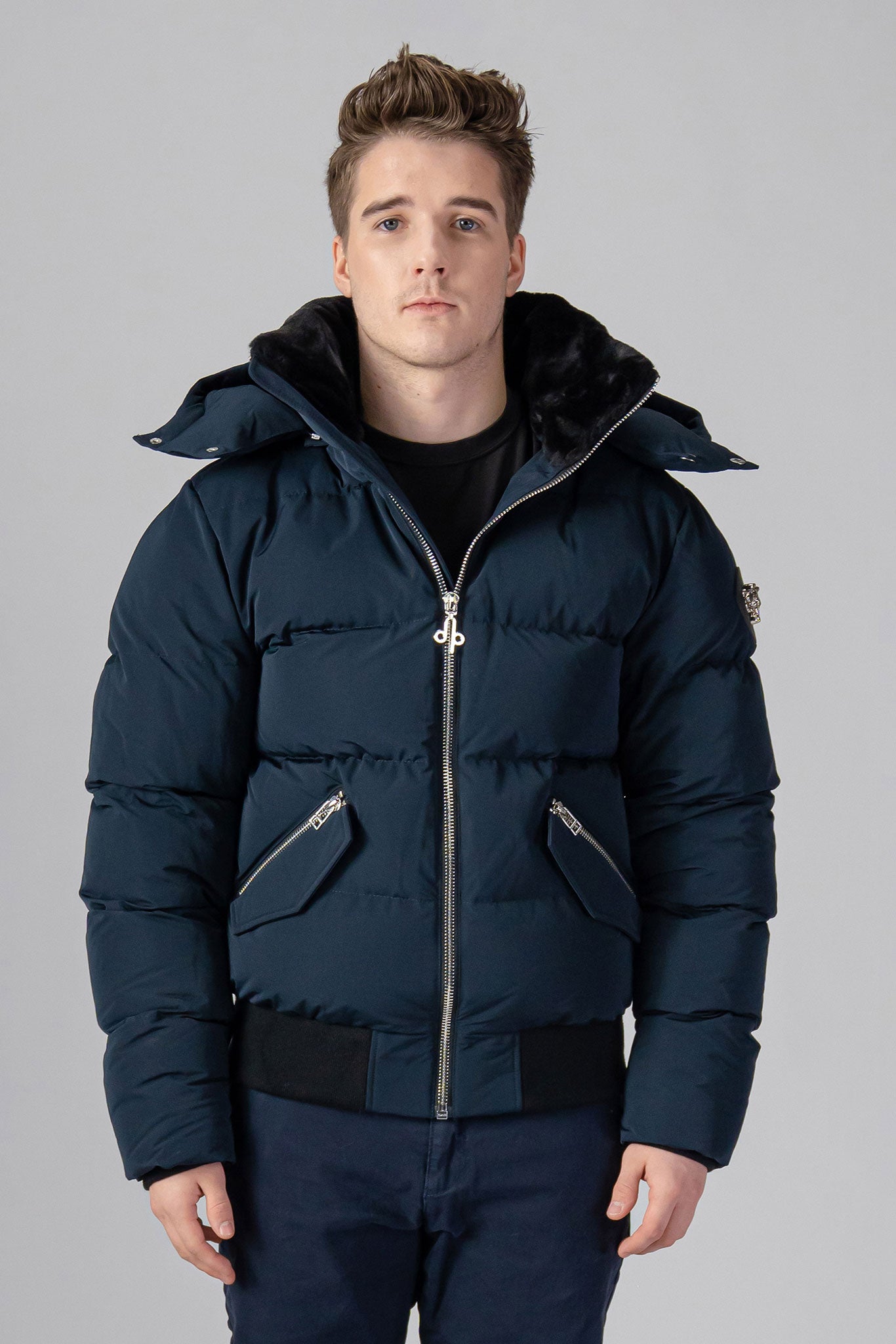 Woodpecker Men's Woody Bomber Winter coat. High-end Canadian designer winter coat for men in “Matte Navy