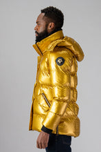 Load image into Gallery viewer, High-end Canadian designer winter coat for men in &quot;Gold&quot; colour. Woodpecker cruelty-free winter coat designed in Canada. Men&#39;s heavy weight medium length premium designer jacket for winter. Superior quality warm winter coat for men. Moose Knuckles, Canada Goose, Mackage, Montcler, Will Poho, Willbird, Nic Bayley. Shiny parka. Stylish winter jacket. Designer winter coat.
