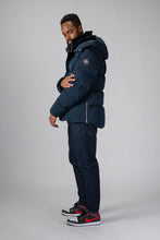 Load image into Gallery viewer, High-end Canadian designer winter coat for men in &quot;Matte Navy&quot; colour. Woodpecker cruelty-free winter coat designed in Canada. Men&#39;s heavy weight medium length premium designer jacket for winter. Superior quality warm winter coat for men. Moose Knuckles, Canada Goose, Mackage, Montcler, Will Poho, Willbird, Nic Bayley. Shiny parka. Stylish winter jacket. Designer winter coat.
