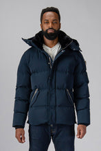 Load image into Gallery viewer, High-end Canadian designer winter coat for men in &quot;Matte Navy&quot; colour. Woodpecker cruelty-free winter coat designed in Canada. Men&#39;s heavy weight medium length premium designer jacket for winter. Superior quality warm winter coat for men. Moose Knuckles, Canada Goose, Mackage, Montcler, Will Poho, Willbird, Nic Bayley. Shiny parka. Stylish winter jacket. Designer winter coat.
