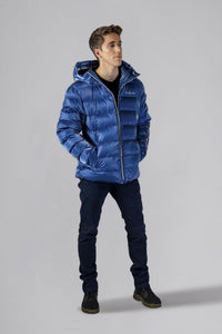 High-end Canadian designer winter coat for men in "Flash Blue" colour. Woodpecker cruelty-free winter coat designed in Canada. Men's medium weight medium length premium designer jacket for winter. Superior quality warm winter coat for men. Moose Knuckles, Canada Goose, Mackage, Montcler, Will Poho, Willbird, Nic Bayley. Shiny parka. Stylish winter jacket. Designer winter coat.
