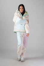 Load image into Gallery viewer, Woodpecker Unisex Fleece Track Pants. High-end Canadian designer winter fleece in &quot;Cream&quot; colour. Woodpecker fleece pants designed in Canada. Warm premium designer fleece pants for winter. Superior quality warm fleece track pants. Moose Knuckles, Canada Goose, Mackage, Montcler, Will Poho, Willbird, Nic Bayley. Cozy for at-home wear.
