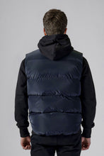 Load image into Gallery viewer, Woodpecker Unisex Winter Vest. High-end Canadian designer winter vest in &quot;Blue Diamond&quot; colour. Woodpecker cruelty-free vest designed in Canada. Heavy weight short length premium designer vest for winter. Superior quality warm winter vest. Moose Knuckles, Canada Goose, Mackage, Montcler, Will Poho, Willbird, Nic Bayley. Extra warm. Shiny vest. Stylish winter vest. Designer winter vest.
