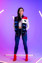 Load image into Gallery viewer, Woodpecker Unisex Winter Vest. High-end Canadian designer winter vest in &quot;Red Winged&quot; red, white and blue colour. Woodpecker cruelty-free vest designed in Canada. Heavy weight short length premium designer vest for winter. Superior quality warm winter vest. Moose Knuckles, Canada Goose, Mackage, Montcler, Will Poho, Willbird, Nic Bayley. Extra warm. Shiny vest. Stylish winter vest. Designer winter vest.
