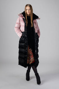 Woodpecker Women's Extra Long Bird of Paradise Winter coat. High-end Canadian designer winter coat for women in “Arctic Rose and Black" colour. Woodpecker cruelty-free winter coat designed in Canada. Women's heavy weight extra long length premium designer jacket for winter. Superior quality warm winter coat for women. Moose Knuckles, Canada Goose, Mackage, Montcler, Will Poho, Willbird, Nic Bayley. Extra warm. Shiny parka. Stylish winter jacket. Designer winter coat.