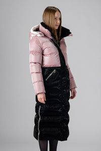 Woodpecker Women's Extra Long Bird of Paradise Winter coat. High-end Canadian designer winter coat for women in “Arctic Rose and Black" colour. Woodpecker cruelty-free winter coat designed in Canada. Women's heavy weight extra long length premium designer jacket for winter. Superior quality warm winter coat for women. Moose Knuckles, Canada Goose, Mackage, Montcler, Will Poho, Willbird, Nic Bayley. Extra warm. Shiny parka. Stylish winter jacket. Designer winter coat.