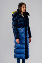 Load image into Gallery viewer, Woodpecker Women&#39;s Extra Long Bird of Paradise Winter coat. High-end Canadian designer winter coat for women in “Blue Yellow&quot; colour. Woodpecker cruelty-free winter coat designed in Canada. Women&#39;s heavy weight extra long length premium designer jacket for winter. Superior quality warm winter coat for women. Moose Knuckles, Canada Goose, Mackage, Montcler, Will Poho, Willbird, Nic Bayley. Extra warm. Shiny parka. Stylish winter jacket. Designer winter coat.
