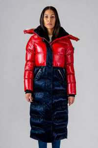 Woodpecker Women's Extra Long Bird of Paradise Winter coat. High-end Canadian designer winter coat for women in “Red White and Blue" colour. Woodpecker cruelty-free winter coat designed in Canada. Women's heavy weight extra long length premium designer jacket for winter. Superior quality warm winter coat for women. Moose Knuckles, Canada Goose, Mackage, Montcler, Will Poho, Willbird, Nic Bayley. Extra warm. Shiny parka. Stylish winter jacket. Designer winter coat.
