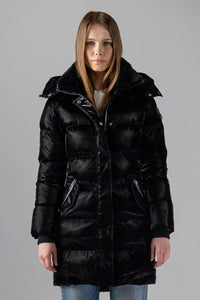 Woodpecker Women's Penguin Long Winter coat. High-end Canadian designer winter coat for women in "All Wet Black" colour. Woodpecker cruelty-free winter coat designed in Canada. Women's heavy weight long length premium designer jacket for winter. Superior quality warm winter coat for women. Moose Knuckles, Canada Goose, Mackage, Montcler, Will Poho, Willbird, Nic Bayley. Extra warm. Shiny parka. Stylish winter jacket. Designer winter coat.