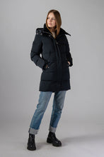 Load image into Gallery viewer, Woodpecker Women&#39;s Penguin Long Winter coat. High-end Canadian designer winter coat for women in &quot;Matte Black&quot; colour. Woodpecker cruelty-free winter coat designed in Canada. Women&#39;s heavy weight long length premium designer jacket for winter. Superior quality warm winter coat for women. Moose Knuckles, Canada Goose, Mackage, Montcler, Will Poho, Willbird, Nic Bayley. Extra warm. Shiny parka. Stylish winter jacket. Designer winter coat.
