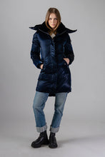 Load image into Gallery viewer, Woodpecker Women&#39;s Unquilted Penguin Long Winter coat. High-end Canadian designer winter coat for women in &quot;All Wet Navy&quot; colour. Woodpecker cruelty-free winter coat designed in Canada. Women&#39;s heavy weight long length premium designer jacket for winter. Superior quality warm winter coat for women. Moose Knuckles, Canada Goose, Mackage, Montcler, Will Poho, Willbird, Nic Bayley. Extra warm. Shiny parka. Stylish winter jacket. Designer winter coat.
