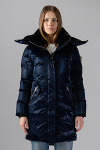 Woodpecker Women's Unquilted Penguin Long Winter coat. High-end Canadian designer winter coat for women in "All Wet Navy" colour. Woodpecker cruelty-free winter coat designed in Canada. Women's heavy weight long length premium designer jacket for winter. Superior quality warm winter coat for women. Moose Knuckles, Canada Goose, Mackage, Montcler, Will Poho, Willbird, Nic Bayley. Extra warm. Shiny parka. Stylish winter jacket. Designer winter coat.