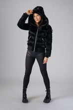Load image into Gallery viewer, Woodpecker Women&#39;s Woody Bomber Winter coat. High-end Canadian designer winter coat for women in shiny “All Wet Black&quot;. Woodpecker cruelty-free winter coat designed in Canada. Women&#39;s heavy weight short length premium designer jacket for winter. Superior quality warm winter coat for women. Moose Knuckles, Canada Goose, Mackage, Montcler, Will Poho, Willbird, Nic Bayley. Shiny parka. Stylish winter jacket. Designer winter coat.
