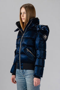 Woodpecker Women's Woody Bomber Winter coat. High-end Canadian designer winter coat for women in shiny “All Wet Navy". Woodpecker cruelty-free winter coat designed in Canada. Women's heavy weight short length premium designer jacket for winter. Superior quality warm winter coat for women. Moose Knuckles, Canada Goose, Mackage, Montcler, Will Poho, Willbird, Nic Bayley. Shiny parka. Stylish winter jacket. Designer winter coat.