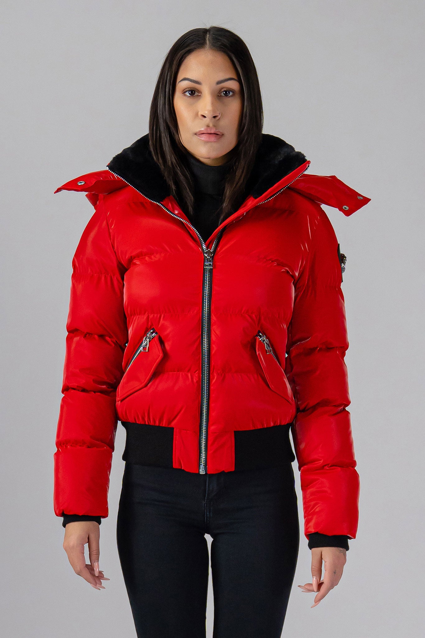 Woodpecker Women's Woody Bomber Winter coat. High-end Canadian designer winter coat for women in shiny “All Wet Red