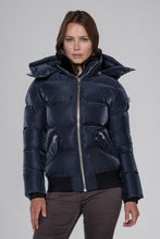 Load image into Gallery viewer, Woodpecker Women&#39;s Woody Bomber Winter coat. High-end Canadian designer winter coat for women in &quot;Blue Diamond&quot; colour. Woodpecker cruelty-free winter coat designed in Canada. Women&#39;s heavy weight short length premium designer jacket for winter. Superior quality warm winter coat for women. Moose Knuckles, Canada Goose, Mackage, Montcler, Will Poho, Willbird, Nic Bayley. Shiny parka. Stylish winter jacket. Designer winter coat.
