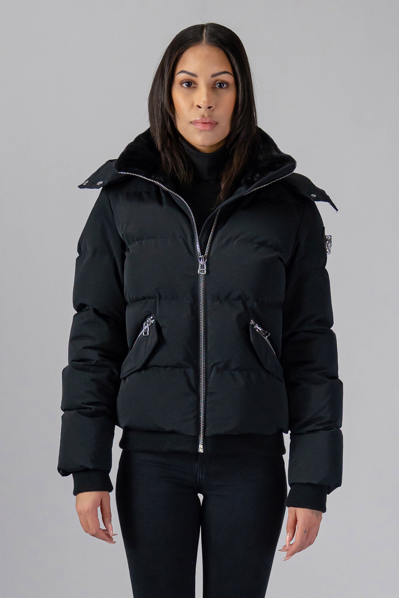Woodpecker Women's Woody Bomber Winter coat. High-end Canadian designer winter coat for women in shiny “Matte Black