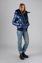 Load image into Gallery viewer, Woodpecker Women&#39;s Woody Bomber Winter coat. High-end Canadian designer winter coat for women in &quot;Sapphire&quot; colour. Woodpecker cruelty-free winter coat designed in Canada. Women&#39;s heavy weight short length premium designer jacket for winter. Superior quality warm winter coat for women. Moose Knuckles, Canada Goose, Mackage, Montcler, Will Poho, Willbird, Nic Bayley. Shiny parka. Stylish winter jacket. Designer winter coat.
