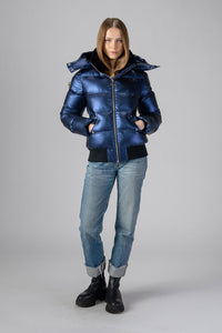 Woodpecker Women's Woody Bomber Winter coat. High-end Canadian designer winter coat for women in "Sapphire" colour. Woodpecker cruelty-free winter coat designed in Canada. Women's heavy weight short length premium designer jacket for winter. Superior quality warm winter coat for women. Moose Knuckles, Canada Goose, Mackage, Montcler, Will Poho, Willbird, Nic Bayley. Shiny parka. Stylish winter jacket. Designer winter coat.