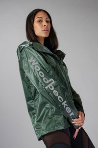 Woodpecker Women's Wind Shell coat. High-end Canadian designer activewear coat for women in "Green Diamond" colour. Woodpecker coat designed in Canada. Moose Knuckles, Canada Goose, Mackage, Montcler, Will Poho, Willbird, Nic Bayley.