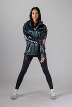 Load image into Gallery viewer, Woodpecker Women&#39;s Wind Shell coat. High-end Canadian designer activewear coat for women in &quot;Raven Black&quot; colour. Woodpecker coat designed in Canada. Moose Knuckles, Canada Goose, Mackage, Montcler, Will Poho, Willbird, Nic Bayley.
