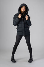 Load image into Gallery viewer, Woodpecker Women&#39;s Bumnester Winter coat. High-end Canadian designer winter coat for women in &quot;Matte Black&quot; colour. Woodpecker cruelty-free winter coat designed in Canada. Women&#39;s heavy weight medium length premium designer jacket for winter. Superior quality warm winter coat for women. Moose Knuckles, Canada Goose, Mackage, Montcler, Will Poho, Willbird, Nic Bayley. Extra warm. Shiny parka. Stylish winter jacket. Designer winter coat.
