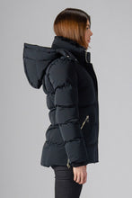 Load image into Gallery viewer, Woodpecker Women&#39;s Bumnester Winter coat. High-end Canadian designer winter coat for women in &quot;Matte Black&quot; colour. Woodpecker cruelty-free winter coat designed in Canada. Women&#39;s heavy weight medium length premium designer jacket for winter. Superior quality warm winter coat for women. Moose Knuckles, Canada Goose, Mackage, Montcler, Will Poho, Willbird, Nic Bayley. Extra warm. Shiny parka. Stylish winter jacket. Designer winter coat.
