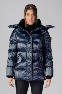 Woodpecker Women's Bumnester Winter coat. High-end Canadian designer winter coat for women in "Oily Blue" colour. Woodpecker cruelty-free winter coat designed in Canada. Women's heavy weight medium length premium designer jacket for winter. Superior quality warm winter coat for women. Moose Knuckles, Canada Goose, Mackage, Montcler, Will Poho, Willbird, Nic Bayley. Extra warm. Shiny parka. Stylish winter jacket. Designer winter coat.
