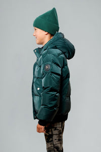 Woodpecker Kids' Chickadee Winter coat. High-end Canadian designer winter coat for Kids in "Green Diamond" colour. Woodpecker cruelty-free winter coat designed in Canada. Kids' heavy weight short length premium designer jacket for winter. Superior quality warm winter coat for kids. Moose Knuckles, Canada Goose, Mackage, Montcler, Will Poho, Willbird, Nic Bayley. Extra warm. Shiny parka. Stylish winter jacket. Designer winter coat.