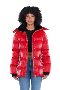 High-end Canadian designer winter coat for women in shiny &quot;all-wet&quot; red colour. Woodpecker vegan winter coat designed in Canada. Women's heavy weight medium length premium designer jacket for winter. Superior quality warm winter coat for women.